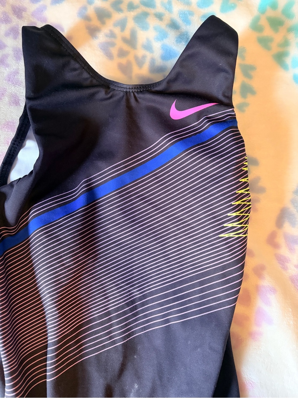 Nike Black Swimsuit with Pink Swoosh and Blue Accent
